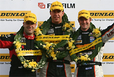 Champions (Matt Neal (centre) the BTCC Champion of 2006 on the podium with Gordon Shedden   (right) and Fabrizio Giovanardi (Ieft), at Silverstone)