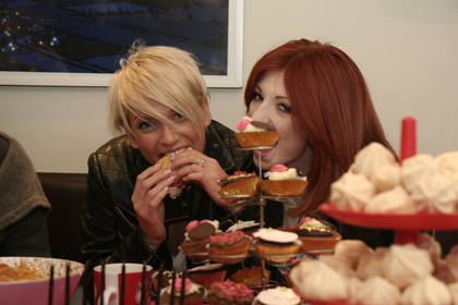 Sarah and Nicola tuck into the cakes