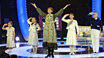 Connie Fisher on stage with children