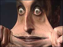 Man stretching face