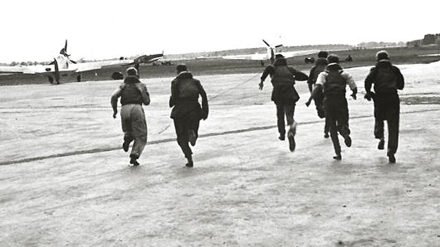 A RAF fighter squadron 'scrambles' after receiving the signal to engage the enemy during the Battle of Britain. 