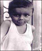 Shy Kid Main 1: My favouite image. Child waiting for ice-cream truck, Saket Delhi. 