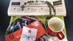 David Melding's impressive shot, including the markets section of a newspaper, rosary and lottery ticket