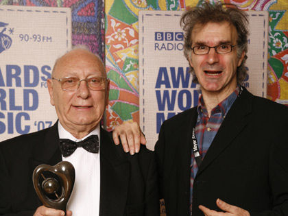 Maurice el Medioni with award presenter Ben Mandelson.