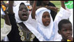 Young supporters of al-Bashir