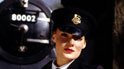 Nancy Brisley (Kelly Harrison)