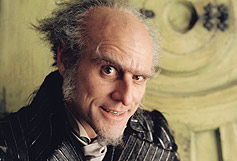 Image:Pictured: JIM CARREY stars as Count Olaf in DreamWorks Picture's LEMONY SNICKET'S A SERIES OF UNFORTUNATE EVENTS Photo Credit: Francois Duhamel,Copyright: (TM) & © 2004 by DreamWorks LLC and Paramount Pictures Corporation. All rights reserved