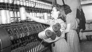 Women with spinning flax