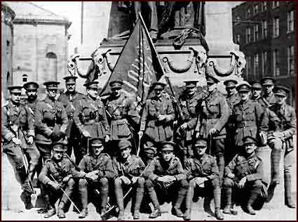 Image of army officers with captured Republican flag