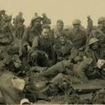 On the back of this photograph my father wrote "My  comrades and friends evacuated from Dunkirk - To my mother - Sydney Arthur Hewer"