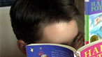 Boy reading a book