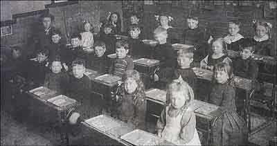 Children seated at desks