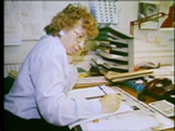 Woman sitting at desk