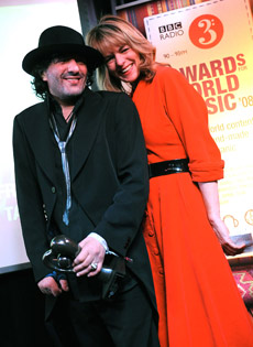 Rachid Taha accepted his award from Lucinda Strummer (image by Elliott Franks)
