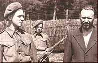 Photograph showing captured Alex Pickowski, Camp Commandant of Dechau concentration camp