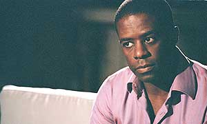 Adrian Lester plays Mickey 'Bricks' Stone