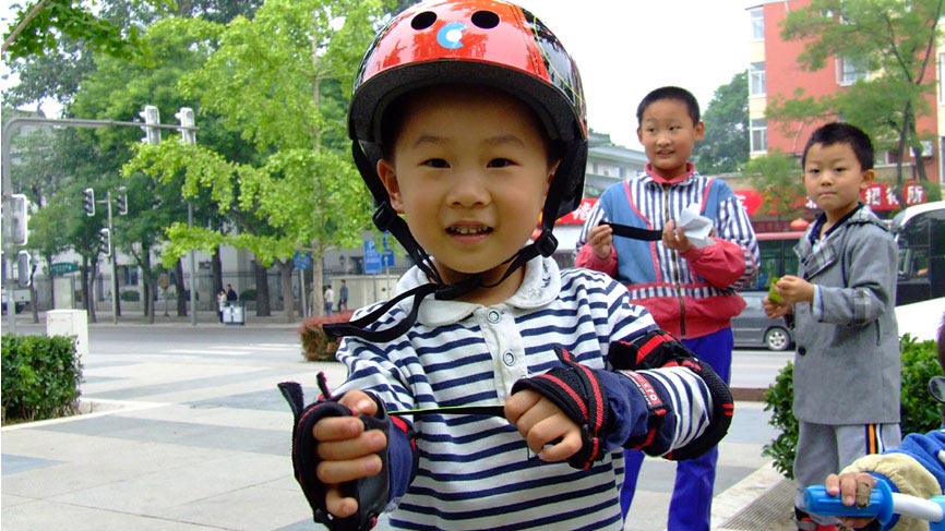 Boy with a bike helmet - Beijing.