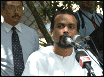 Wimal Weerawnsa addressing soldiers as Defence Secretary Gotabhaya Rajapaksa looks on (Library photo)