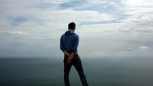 Man looking out to sea