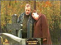 Couple at grave