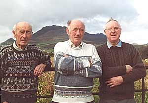 From Left to right above: Bobby Davey, his brother Willie and Tom Newell, three of the many courageous men who burrowed underground for three solid years. The scene behind them is, of course, Slieve Binnian