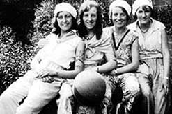 Image: Lucy Wilmshurst (2nd from left holding ball) and a group of friends proudly wearing 'beach pyjamas', on holiday in Bournemouth.  The following week they were banned.
