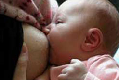 Baby being breastfed