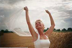 Image: bride in the cornfield - © Andrea Barrett