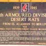 A "Desert Rats" plaque   outside  the Stanford Battle Area.Thetford Forest is amongst its impressive geographical  battle  honours.The divison trained around Stanford,Tottington and West Tofts  from Jan-May 1944.There is no permanent recognition of  the  deserted villages.Only Tottington's war memorial  stands alone by a Breckland  road .