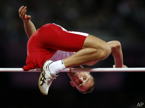 Bronze medallist Lukasz Mamczarz competes in the men's high jump F42 classification.