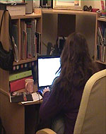 Using her computer