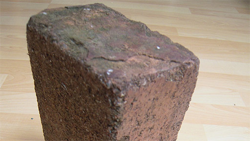 Tim Pocock talks about a brick from the Morris Motors factory in Oxford