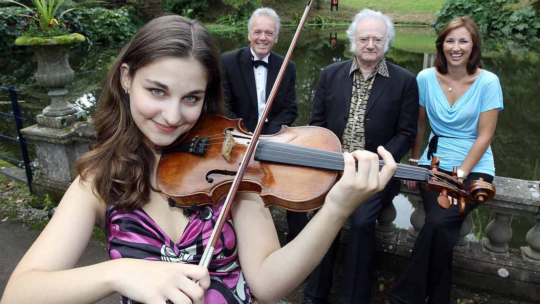 Russian-born violinist Alexandra Soumm, BBC Proms in the Park presenter Noel Thompson, world renowned conductor/composer Carl Davis and BBC Proms in the Park presenter Claire McCollum ©William Cherry / Presseye