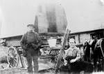 Gypsies resting at their caravan