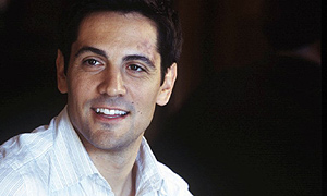 Michael Landes plays Gil Raymond