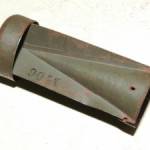 The casing of an incendiary device, which I now use as a vase for daffodils!  It came down on my bedroom windowsill - I've kept it as a souvenir!
