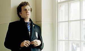 Rafe Spall plays Sean Harding