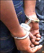 Handcuffed criminal