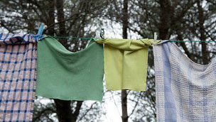Dish cloths on clothing line