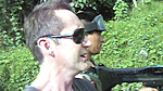 Bruce heads back to the safety of the police fortress after raiding a bossa.