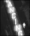 'dancing' sign in neon