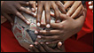 Children holding a football