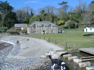 The cottage at Polridmouth Beach, which is thought to be Rebecca's boathouse in the novel.