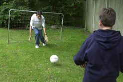 boys playing football