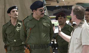 L-R: Hussein Kamel (Amr Waked), Saddam Hussein (Igal Naor), US reporter (Colin Stinton), Barzan Ibrahim (Said Taghmaoui)