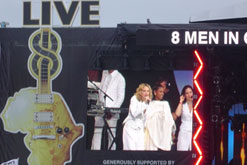 Image: Birhan on stage with Madonna (photographer: Luke Montague/flickr.com)