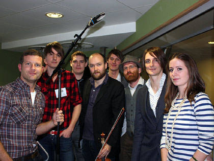 Dermot welcomes the many folk of the Leisure Socieety in for a session.