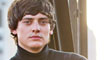 Aneurin Barnard on the rooftop of a New York tower block