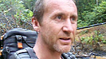 Bruce witnesses some of the destruction caused by an oil spill near Jose Oliya, in the Peruvian jungle.