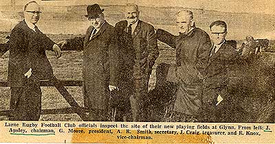 Larne RFC officials inspect the site of their new playing fields at Glynn.
